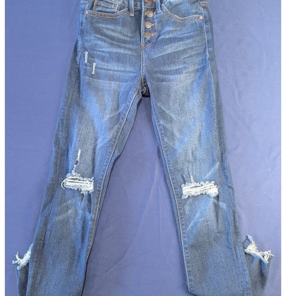 Distressed Blue Jeans